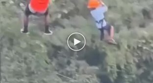 In a Mexican amusement park, a boy fell from a height of 12 meters while riding a cable car with his brother