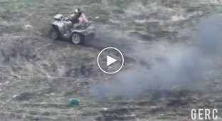 Two occupiers fly on an ATV after hitting an anti-tank mine