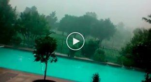 A man rented a swimming pool during a terrible hail storm