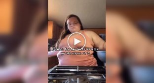 American woman cooks lunch for her children