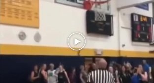 Referee kicks out a ball that got stuck in the ring