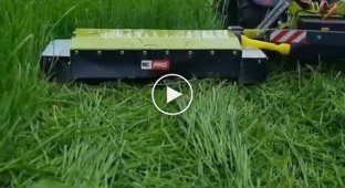Technician from Germany assembled a tiny radio-controlled tractor