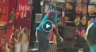 Washing a baking sheet — right in a puddle