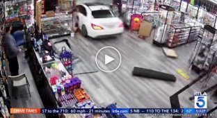 A drunk car driver crashes into a store building
