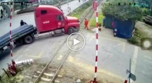 The moment of a collision of a train with a tractor in Vietnam caught on camera