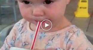 Girl tries Coca-Cola for the first time