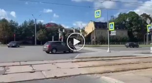 A woman hit a man and gave him a ride on the hood of her Audi Q5