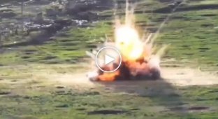 An enemy armored vehicle takes off into the air after running over minu