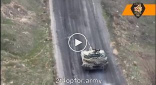 The crew of a Ukrainian armored vehicle attacks the occupiers