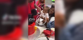 A toddler got too close to a cake