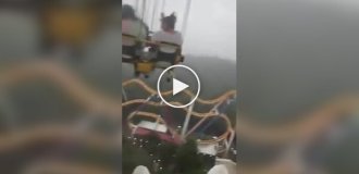 When the rain caught people on a stuck carousel