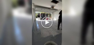 The process of laying a new epoxy self-leveling floor in a garage