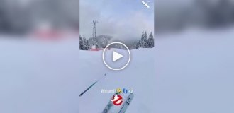 A snowboard rolled down a ski slope Slope without an owner