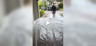 Guy prepares Corvette for hurricane with flood