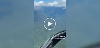 A true miracle of nature: a man showed his flight over the world's tallest waterfall