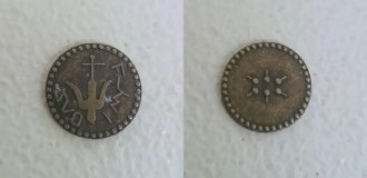 Робота "ілюмінатів": у гаманці чоловіки знайшли загадкову рідкісну монету (3 фото)