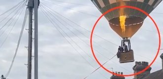 Прохожий предотвратил катастрофу, когда воздушный шар оказался над жилой улицей (2 фото + 1 видео)