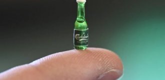 Carlsberg Brewery unveiled a beer bottle the size of a grain of rice (5 photos + 1 video)