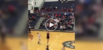 Unusual basketball throw at the final whistle from a girl