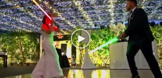 Star Wars fans celebrated their wedding with a lightsaber battle