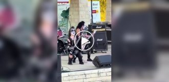 Mini Kiss performs.