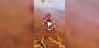 A robotic dog helps put out fires