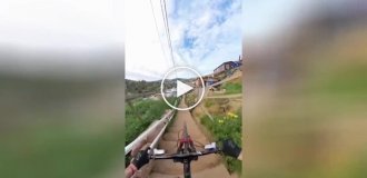 A cyclist filmed his extreme bike ride down a narrow staircase with an action camera