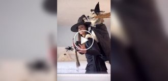 A woman and her dog are well prepared for Halloween