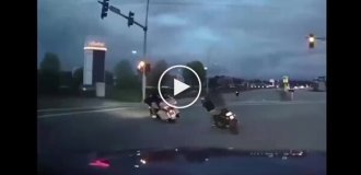 The extreme sportsman miraculously slipped between motorcyclists