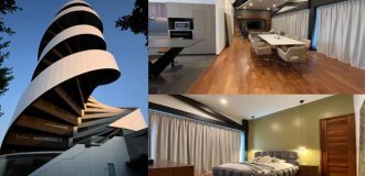 Жилой дом в форме винтовой лестницы (2 фото + 2 видео)