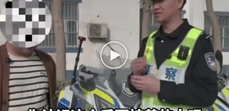 Китаянка запідозрила зраду чоловіка і повисла на причепі його машини, щоб простежити за ним