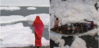 A sacred river in India was covered with poisonous foam (2 photos + 2 videos)