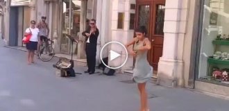 A street musician and an unexpected backup dancer