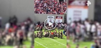 Парашютист врезался в экран на стадионе