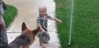 Kid shows his friend that there is no need to be afraid of the sprinkler