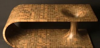 Interesting table with a black hole (5 photos)