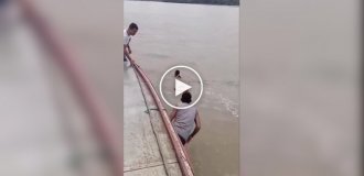 Rescuing a girl from a river in Brazil