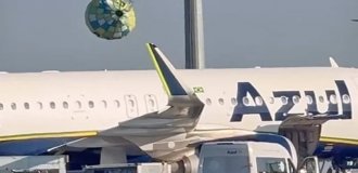 A hot air balloon fell on the territory of an airport in Brazil (2 photos + 2 videos)