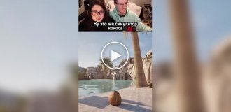 A guy shows a girl a coconut simulator