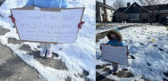 Policeman forced his 6-year-old daughter to stand in the cold with a shameful poster as punishment (6 photos)