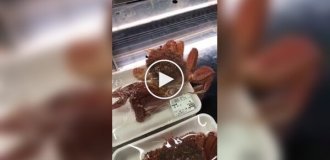 A crab escaped from its packaging in a store.