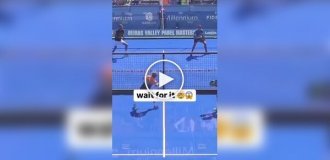 A pickleball player crashed into a glass wall