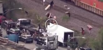 Hundreds of people, mostly African Americans, robbed a freight train in Chicago