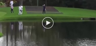 Golfer Jon Rahm launches a ball