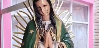 Тревожный знак: образ Девы Марии 1500-х годов покрылся "кровавыми" слезами (3 фото)