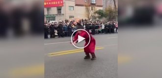 A girl from China amazes with her kung fu skills.