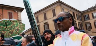 Snoop Dogg carries the Olympic flame (5 photos + video)