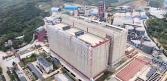 Что это за странный небоскрёб в Китае? (3 фото + видео)