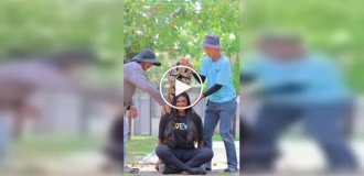 «Улыбнитесь»: рискованные фото с тигром