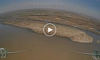 A kamikaze drone attacks an enemy attack drone in the sky over the Dnieper